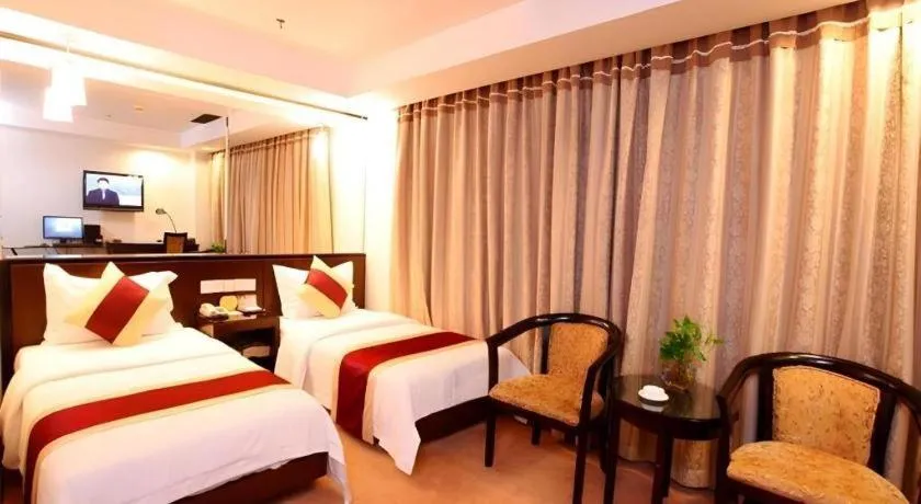 Bed in New World Hotel