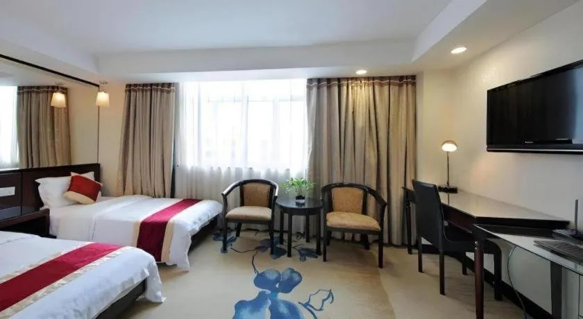 Bed in New World Hotel