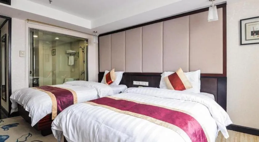 Bed in New World Hotel