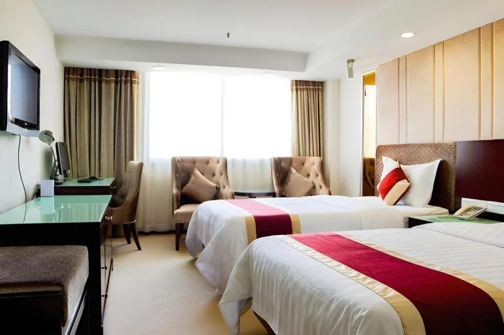 Bed in New World Hotel