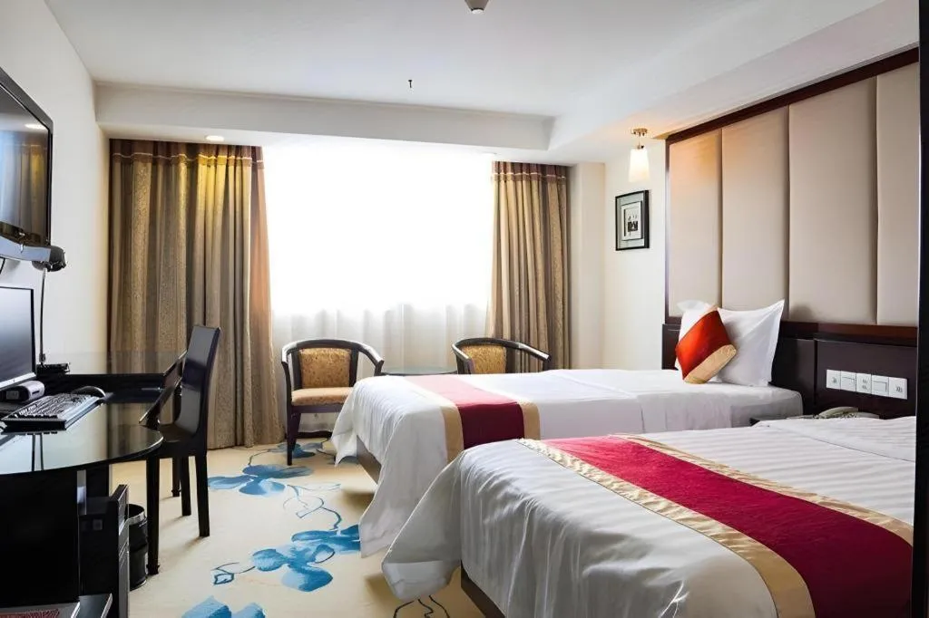 Bed in New World Hotel