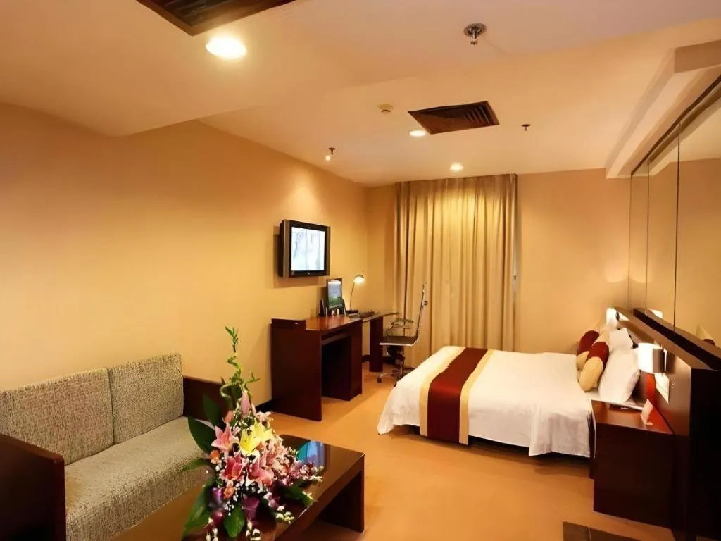 Bed in New World Hotel