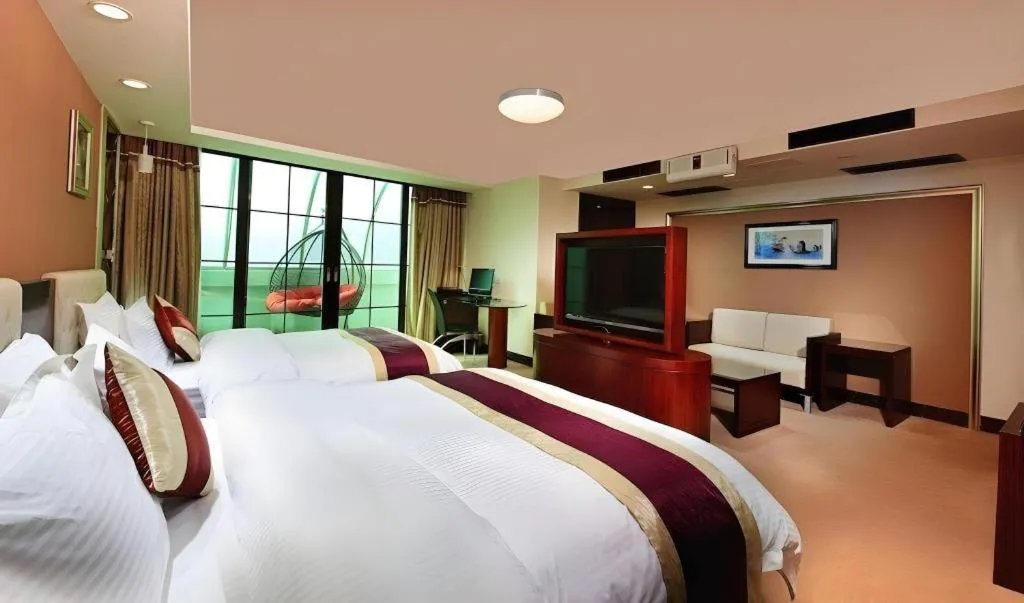 Bed in New World Hotel