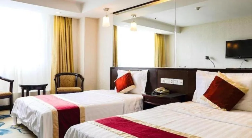 Bed in New World Hotel