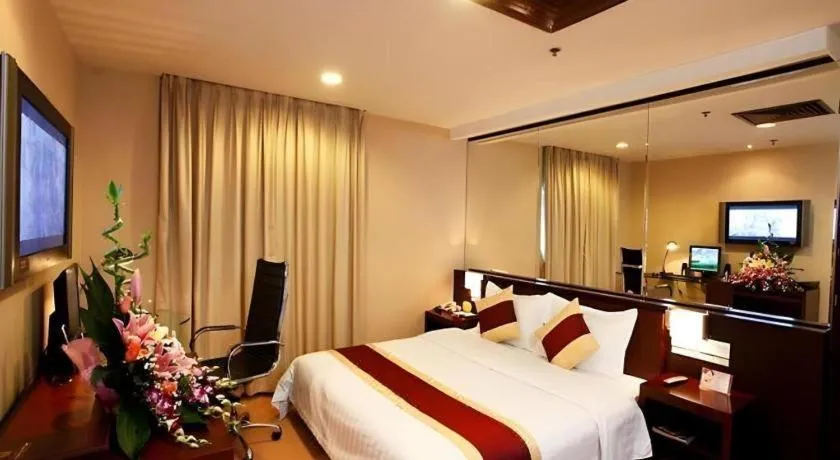 Bed in New World Hotel