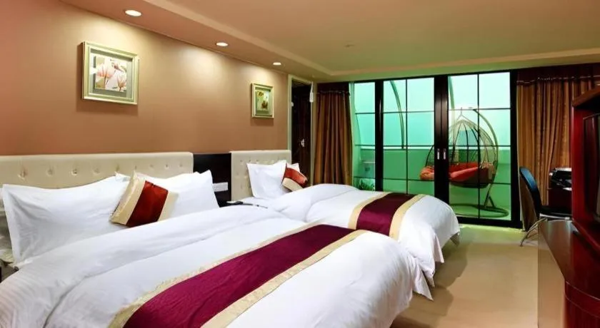 Bed in New World Hotel