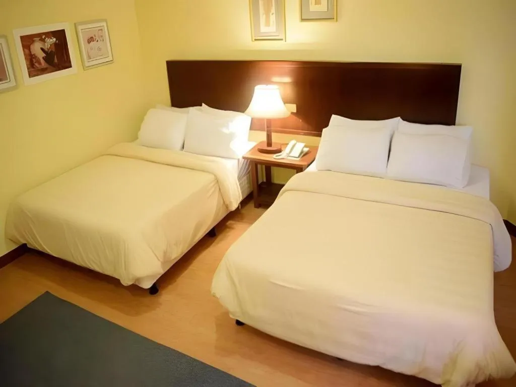 Bed in Subic Park Hotel
