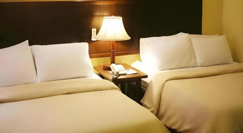 Bed in Subic Park Hotel