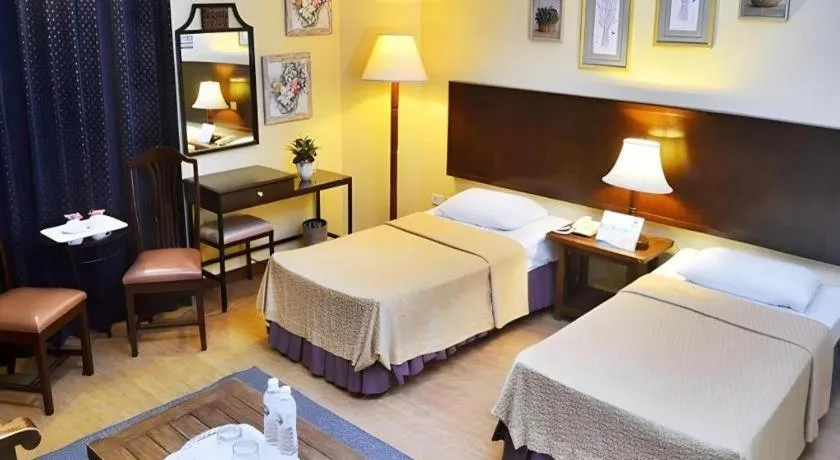 Bed in Subic Park Hotel