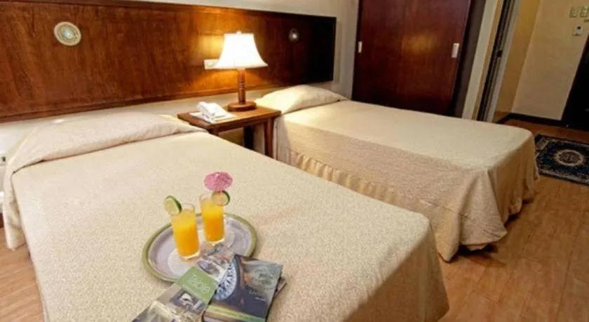 Bed in Subic Park Hotel