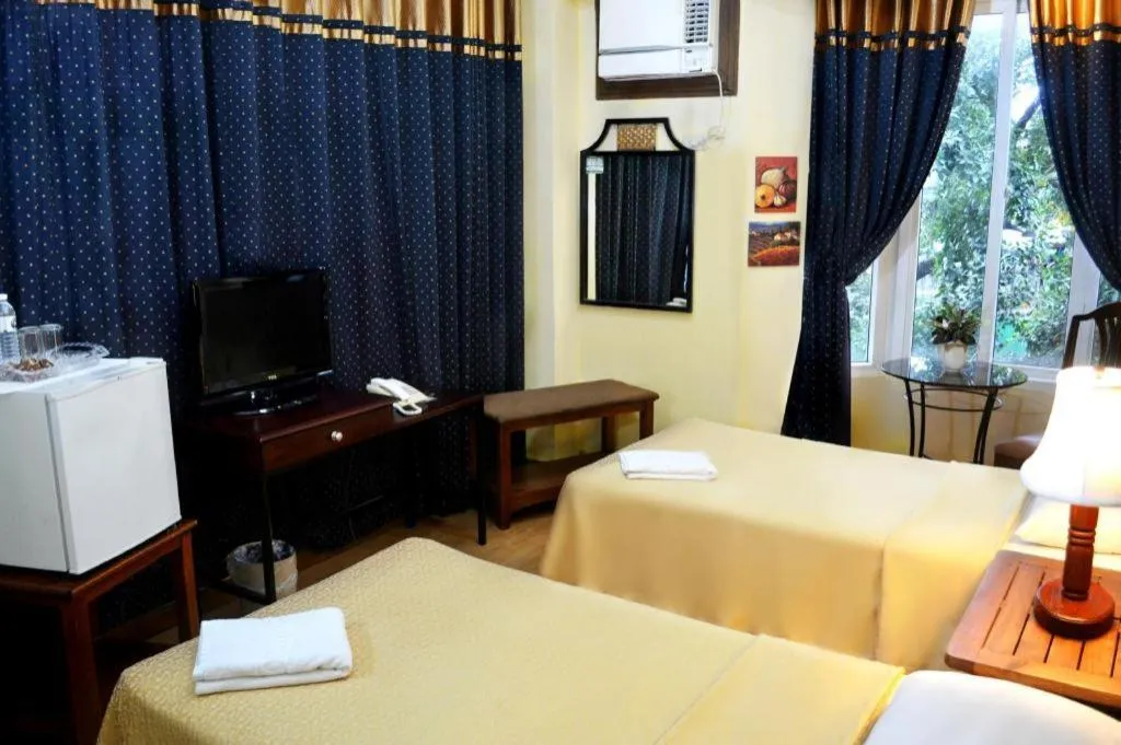 Bed in Subic Park Hotel