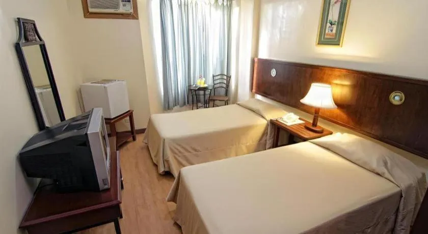 Bed in Subic Park Hotel