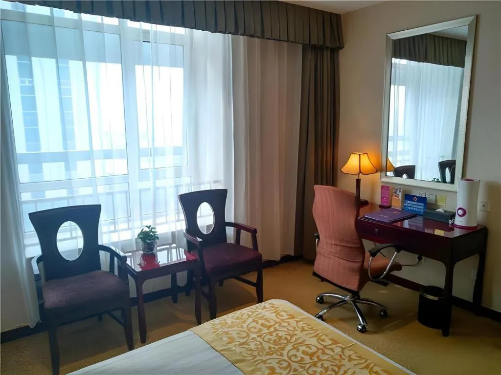 Bed in Zhong Yi Peng Ao Hotel