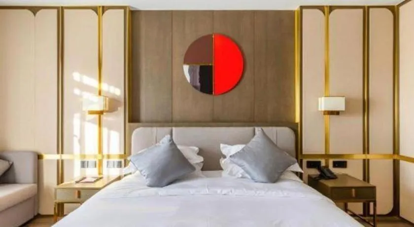 Bed in Zhong Yi Peng Ao Hotel