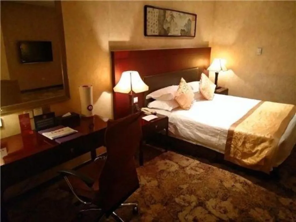 Bed in Zhong Yi Peng Ao Hotel