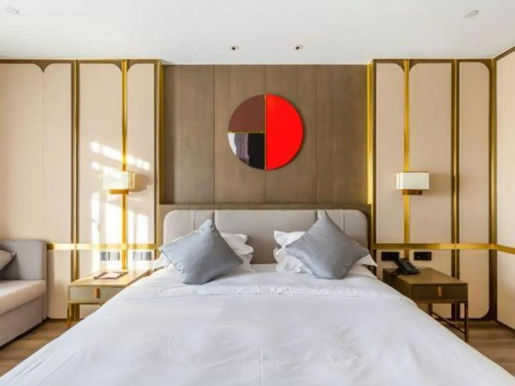 Bed in Zhong Yi Peng Ao Hotel