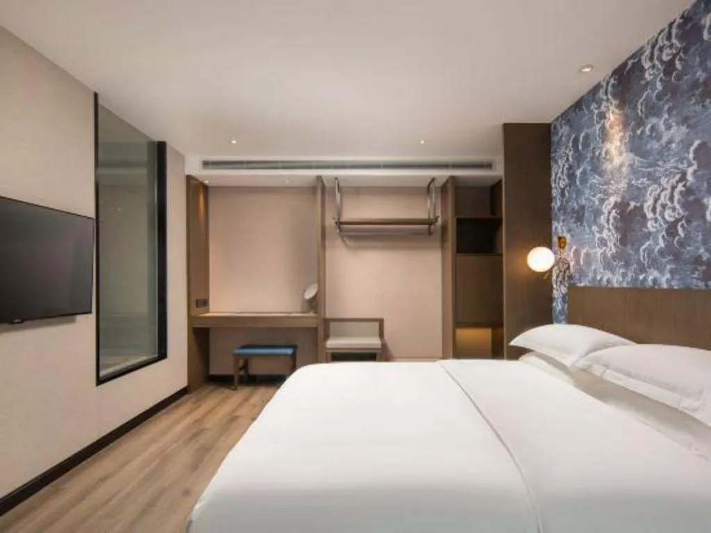 Bed in Zhong Yi Peng Ao Hotel