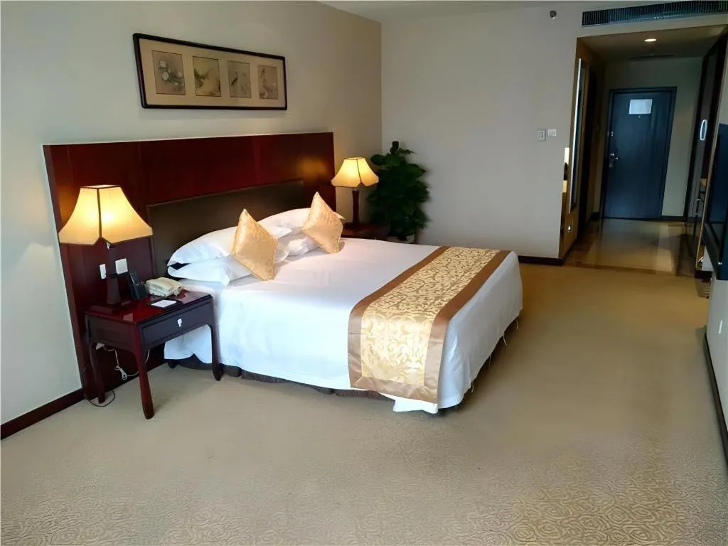 Bed in Zhong Yi Peng Ao Hotel