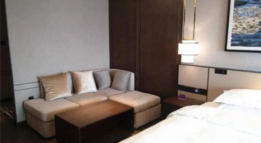 Bed in Zhong Yi Peng Ao Hotel