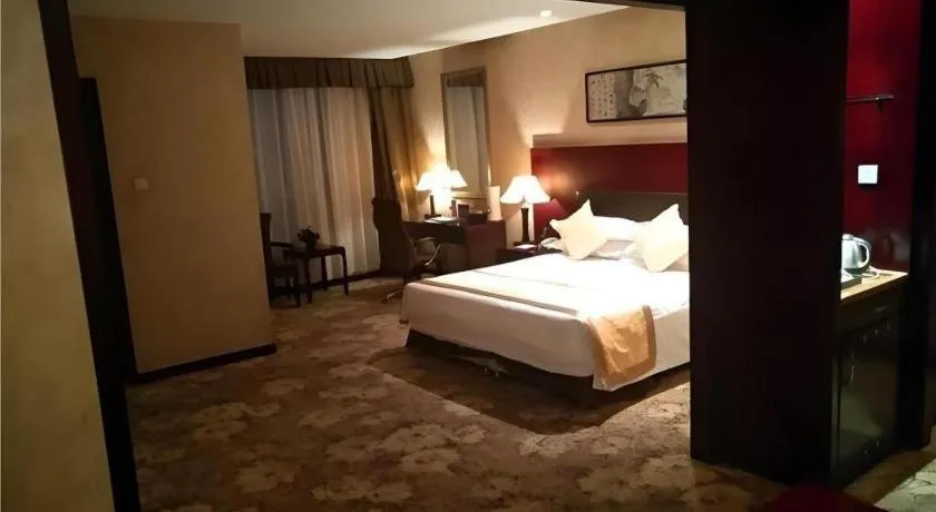 Bed in Zhong Yi Peng Ao Hotel