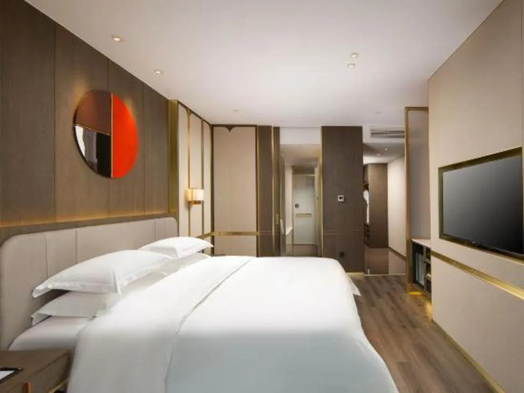 Bed in Zhong Yi Peng Ao Hotel