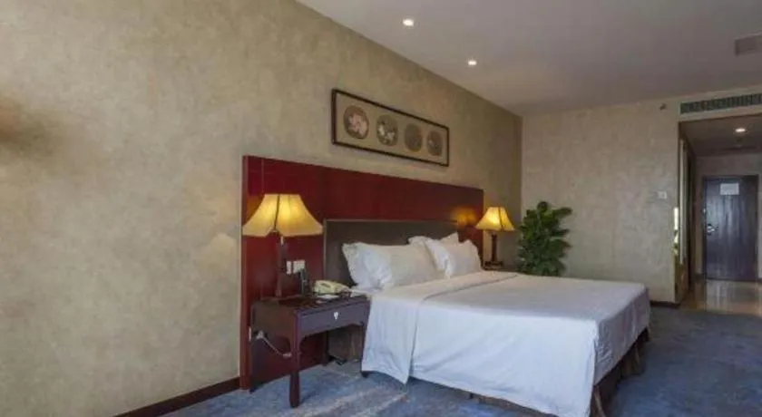 Bed in Zhong Yi Peng Ao Hotel