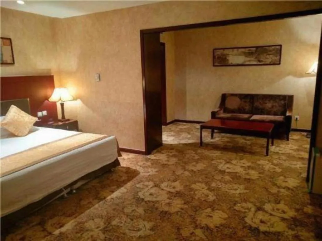 Bed in Zhong Yi Peng Ao Hotel