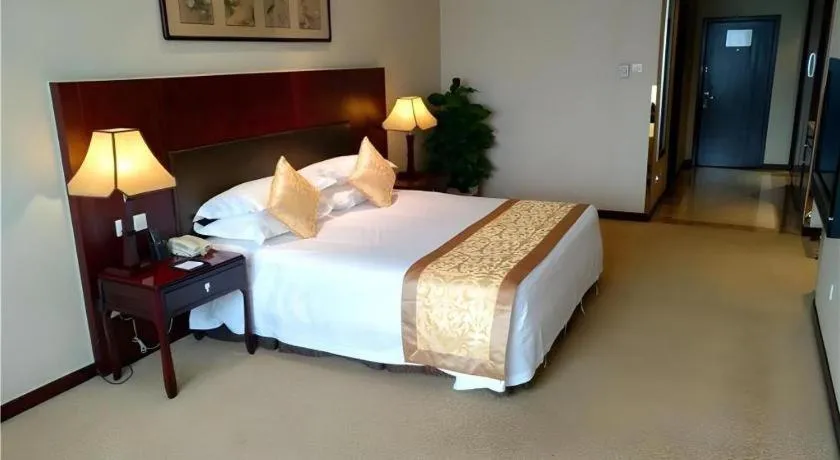 Bed in Zhong Yi Peng Ao Hotel