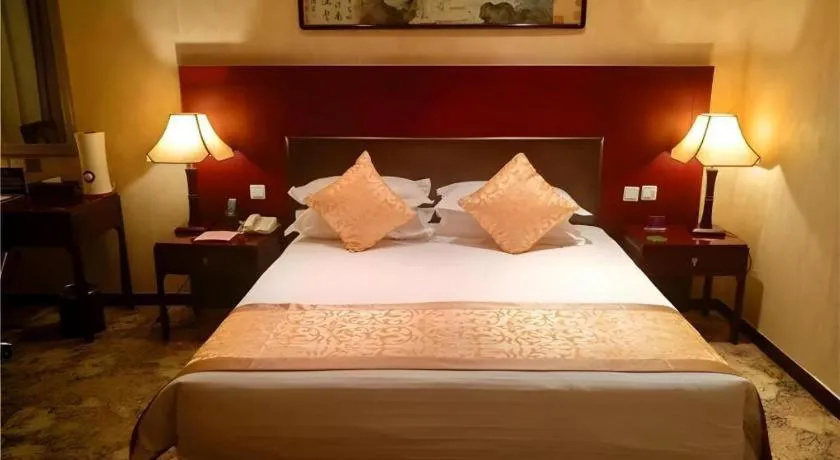 Bed in Zhong Yi Peng Ao Hotel