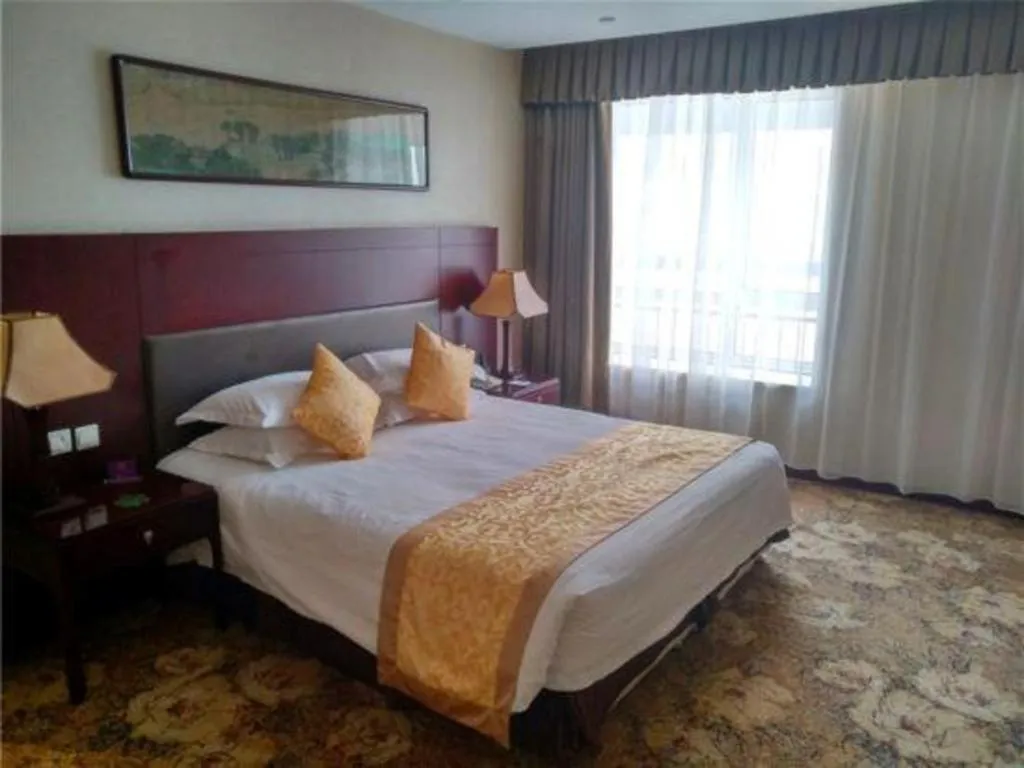 Bed in Zhong Yi Peng Ao Hotel