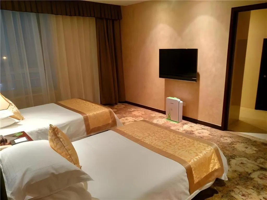 Bed in Zhong Yi Peng Ao Hotel