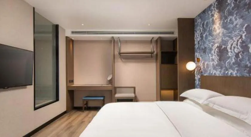 Bed in Zhong Yi Peng Ao Hotel