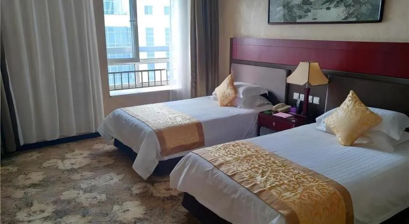 Bed in Zhong Yi Peng Ao Hotel