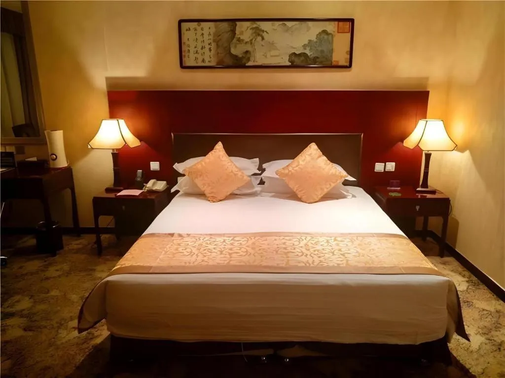 Bed in Zhong Yi Peng Ao Hotel