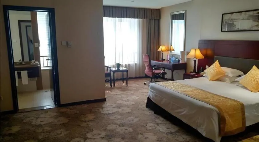 Bed in Zhong Yi Peng Ao Hotel