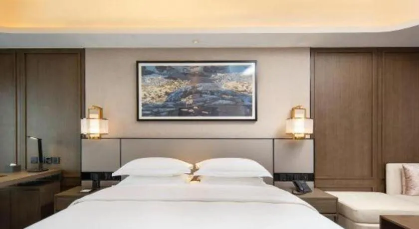 Bed in Zhong Yi Peng Ao Hotel