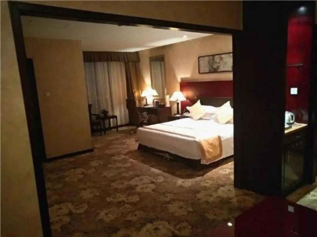 Bed in Zhong Yi Peng Ao Hotel