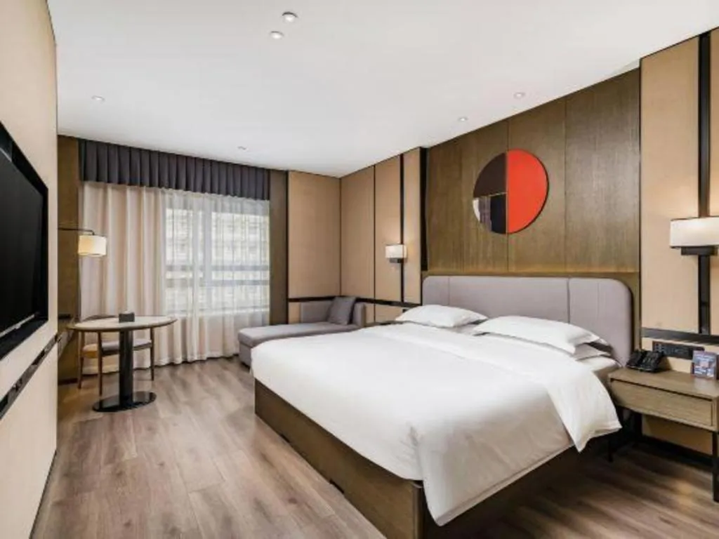 Bed in Zhong Yi Peng Ao Hotel