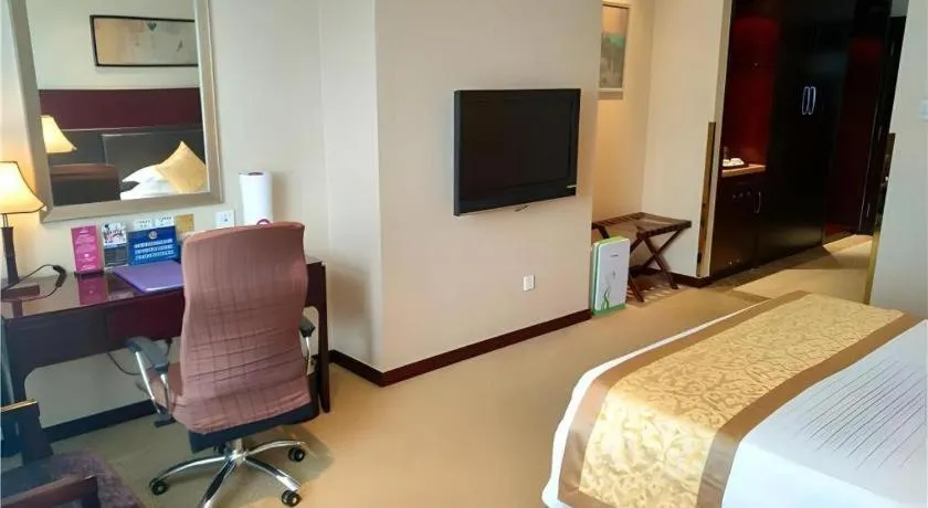 Bed in Zhong Yi Peng Ao Hotel