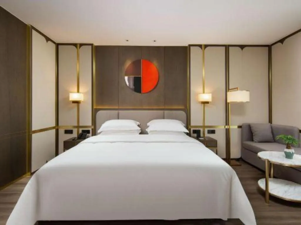 Bed in Zhong Yi Peng Ao Hotel