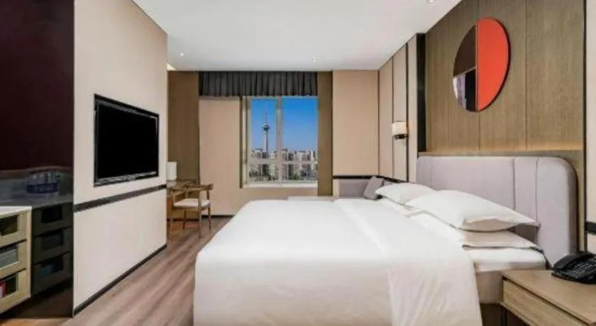 Bed in Zhong Yi Peng Ao Hotel