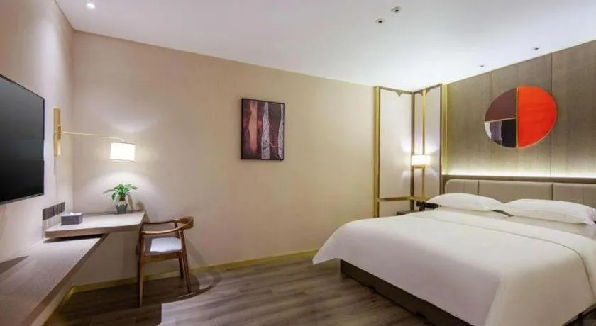 Bed in Zhong Yi Peng Ao Hotel