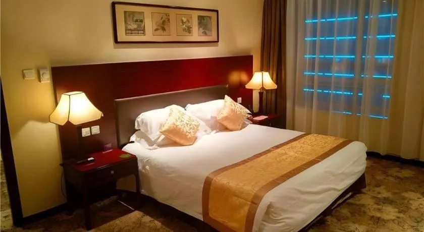 Bed in Zhong Yi Peng Ao Hotel
