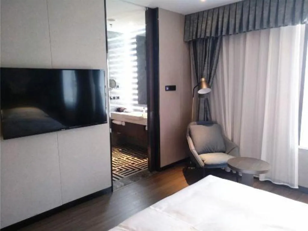 Bed in Zhong Yi Peng Ao Hotel