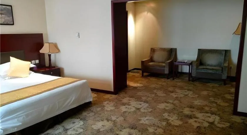 Bed in Zhong Yi Peng Ao Hotel