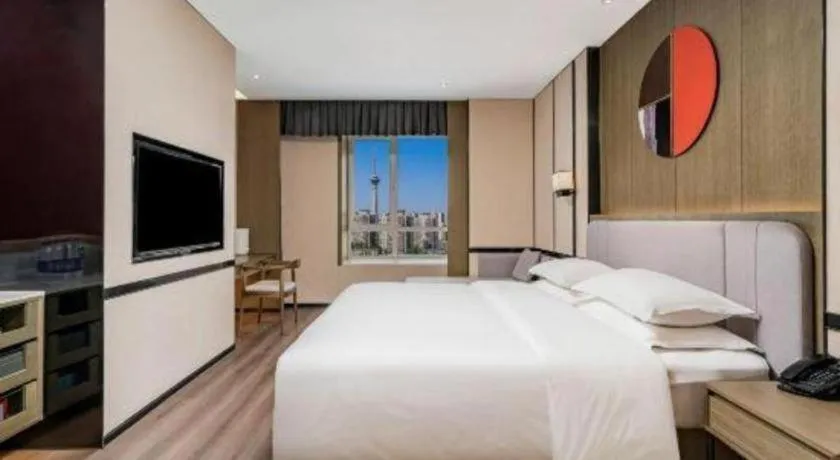 Bed in Zhong Yi Peng Ao Hotel