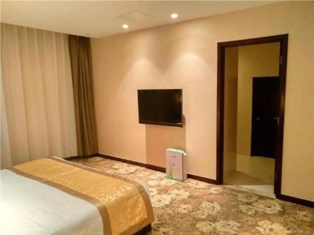 Bed in Zhong Yi Peng Ao Hotel