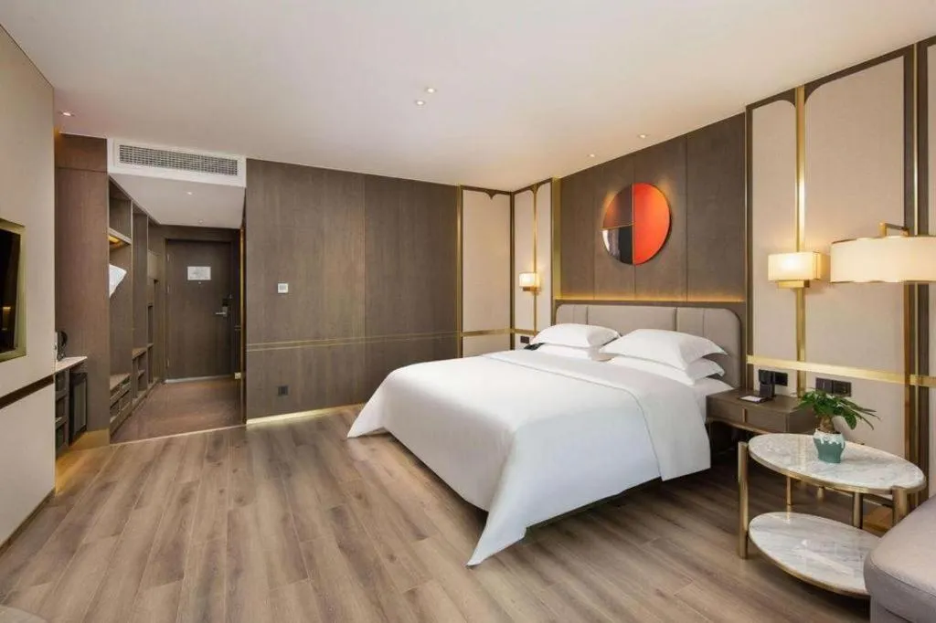 Bed in Zhong Yi Peng Ao Hotel