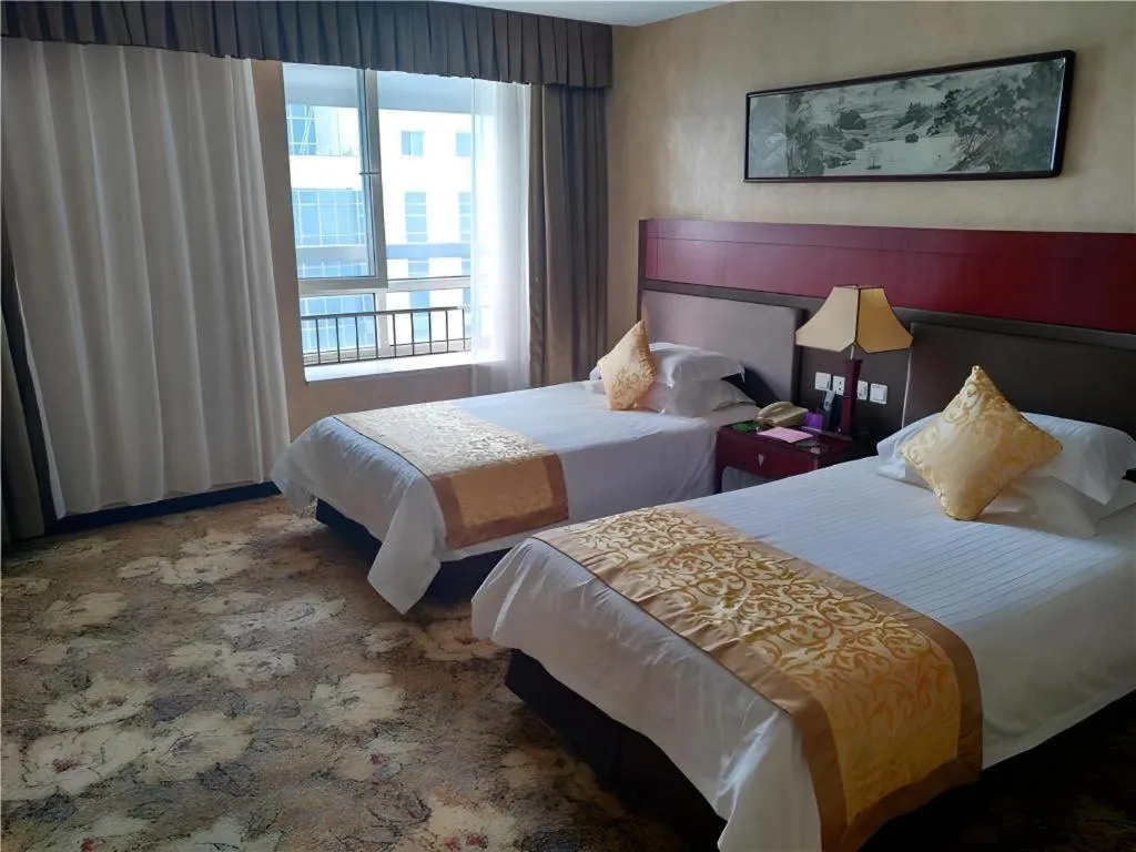 Bed in Zhong Yi Peng Ao Hotel