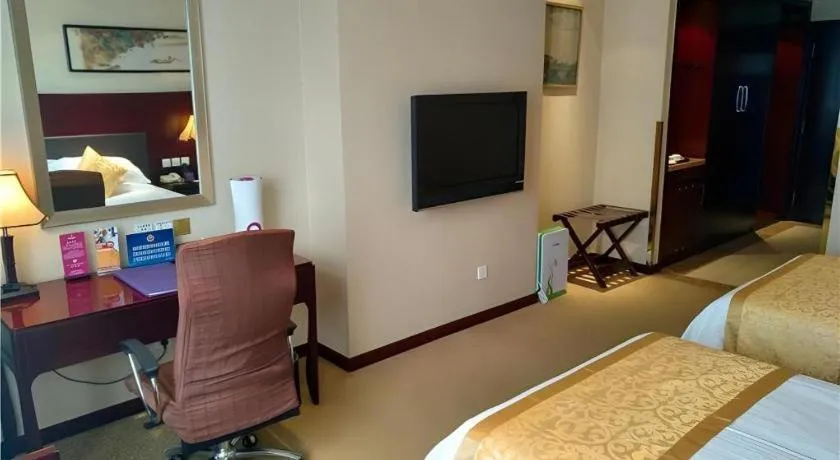 Bed in Zhong Yi Peng Ao Hotel